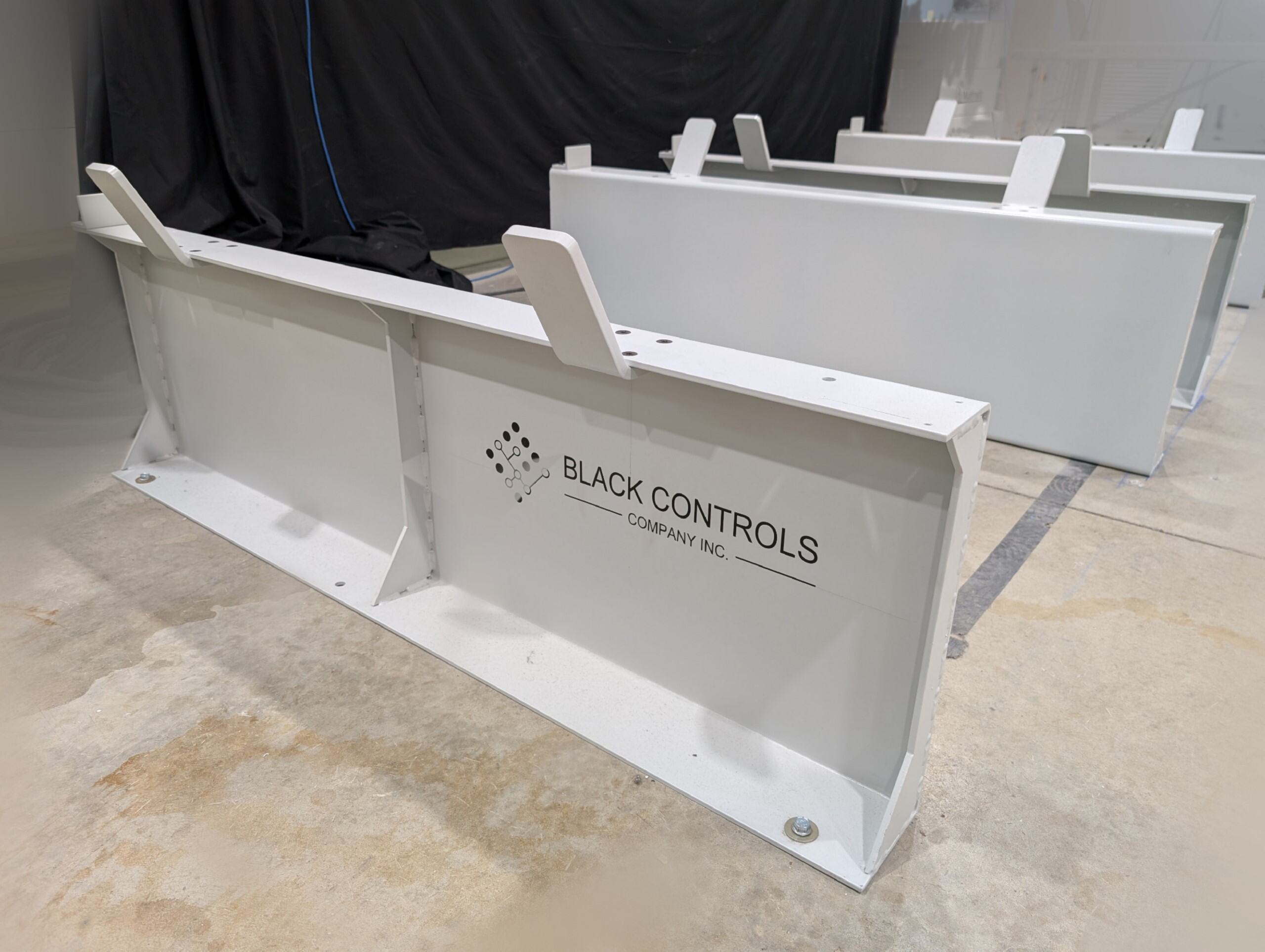 AMRs, Black Controls Common Docking Stands